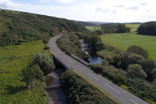 Looking along the main road, just south of the Whiteadder reservoir as it follows the path of the river.