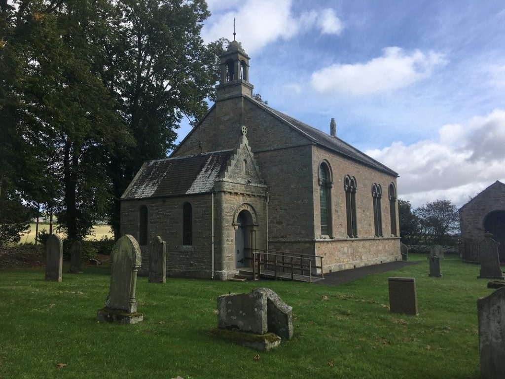 Bonkyl Churchyard with grave stones in the foreground.