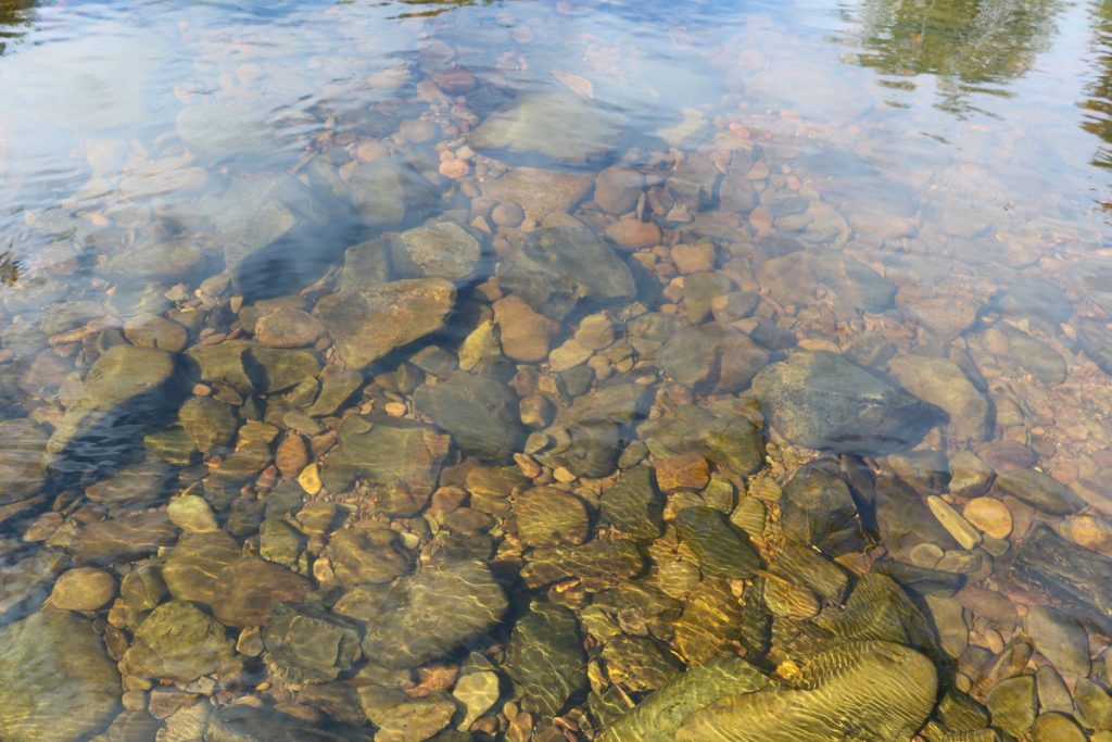 Whiteadder river bed of coloured cobbles.